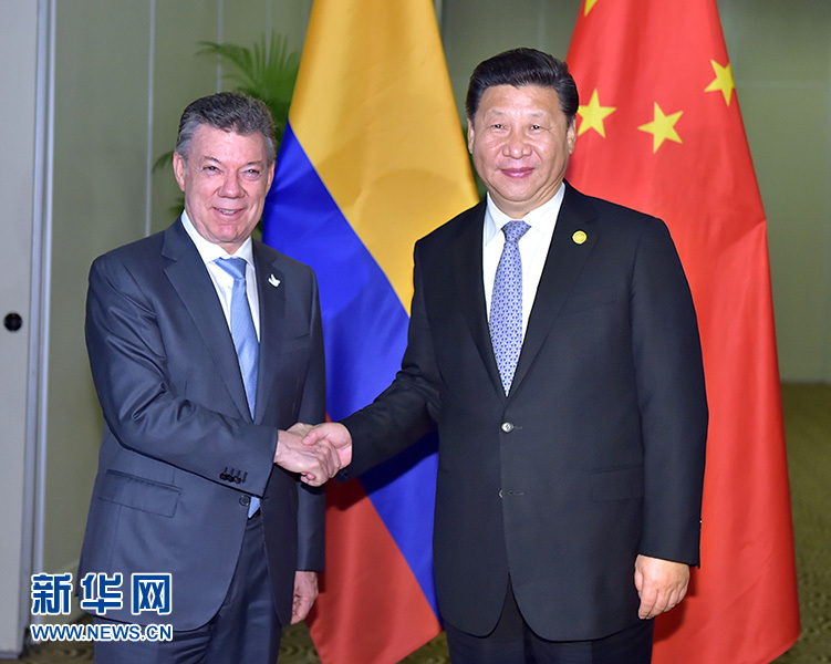 11月19日，國(guó)家主席習(xí)近平在利馬會(huì)見哥倫比亞總統(tǒng)桑托斯。新華社記者 李濤 攝